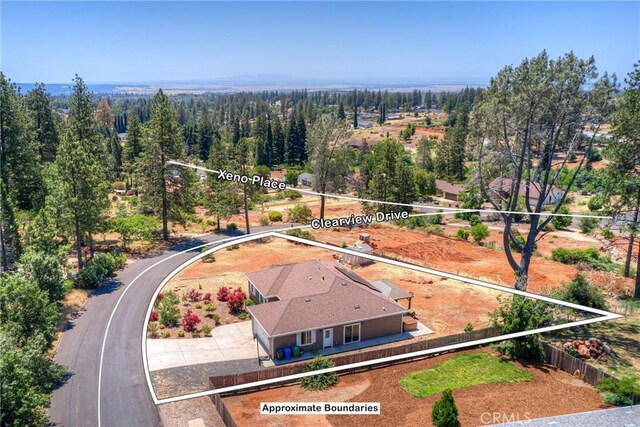 2381 Clearview Dr, Paradise, CA 95969 - aerial view of property and surrounding area featuring property parcel outlined and a forest