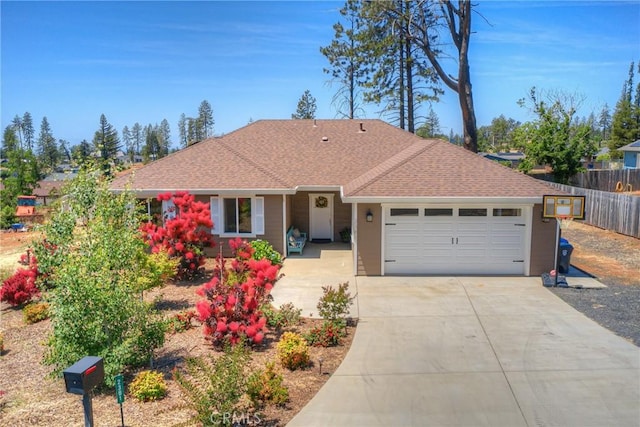 2381 Clearview Dr, Paradise, CA 95969 - single story home with an attached garage, concrete driveway, and roof with shingles