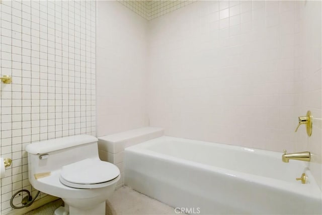 10724 Wilshire Blvd Unit 1010, Los Angeles, CA 90024 - full bathroom with toilet and tile walls