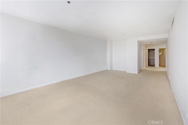 10724 Wilshire Blvd Unit 1010, Los Angeles, CA 90024 - unfurnished room featuring light colored carpet and baseboards