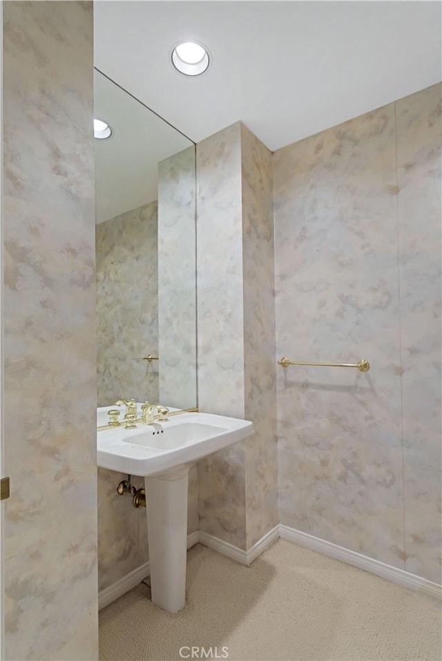 10724 Wilshire Blvd Unit 1010, Los Angeles, CA 90024 - bathroom with baseboards and a sink