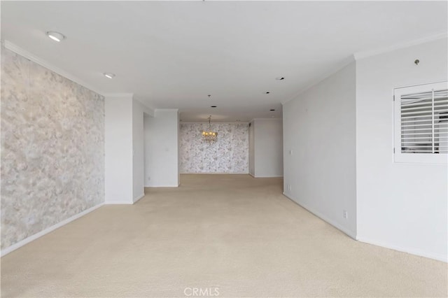 10724 Wilshire Blvd Unit 1010, Los Angeles, CA 90024 - spare room with light colored carpet, a chandelier, wallpapered walls, and ornamental molding