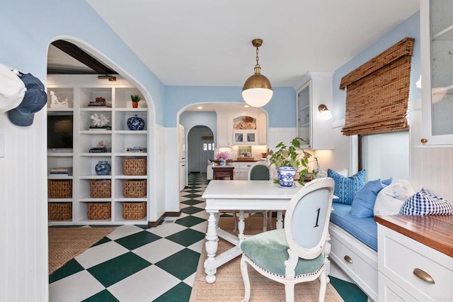 1008 S Ditmar St, Oceanside, CA 92054 - dining space with tile patterned floors and arched walkways