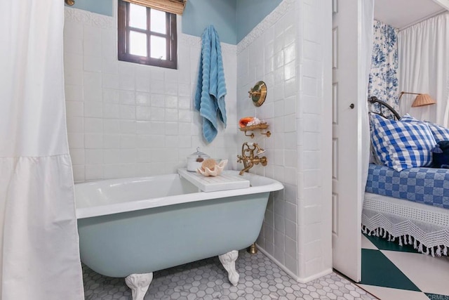 1008 S Ditmar St, Oceanside, CA 92054 - bathroom featuring a freestanding bath and tile walls