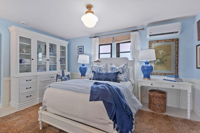 1008 S Ditmar St, Oceanside, CA 92054 - bedroom featuring a wall mounted air conditioner and wainscoting