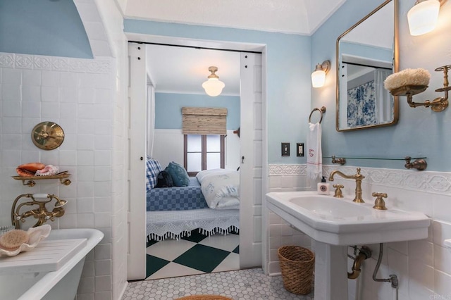 1008 S Ditmar St, Oceanside, CA 92054 - bathroom featuring tile walls, wainscoting, ensuite bathroom, and tile patterned floors