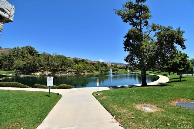 29058 Rosewood Ln, Highland, CA 92346 - surrounding community featuring a water view and a lawn