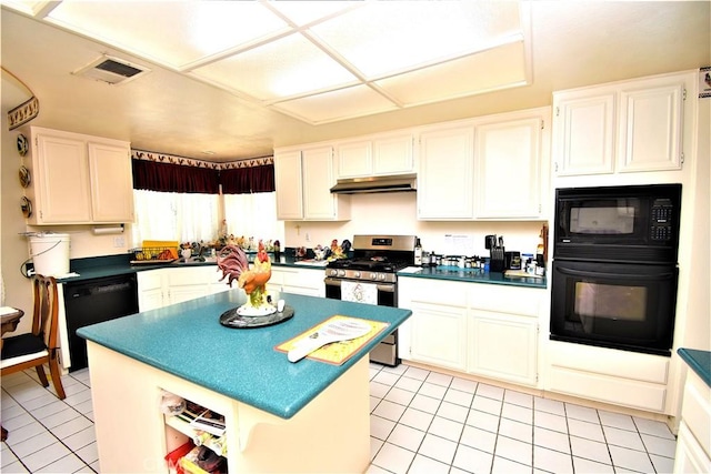 29058 Rosewood Ln, Highland, CA 92346 - kitchen with black appliances, dark countertops, light tile patterned floors, and white cabinets