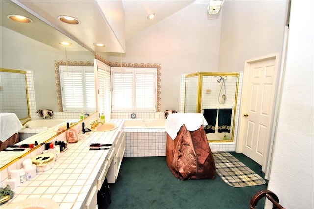 29058 Rosewood Ln, Highland, CA 92346 - full bathroom featuring double vanity, a stall shower, a bath, lofted ceiling, and recessed lighting