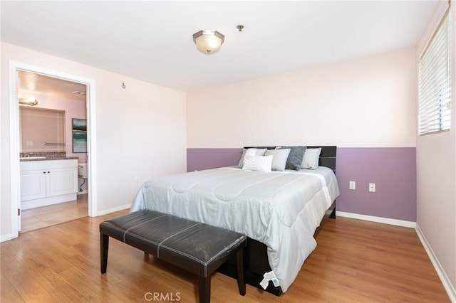 580 W Main St Unit 323, Alhambra, CA 91801 - bedroom with light wood finished floors, baseboards, and ensuite bath