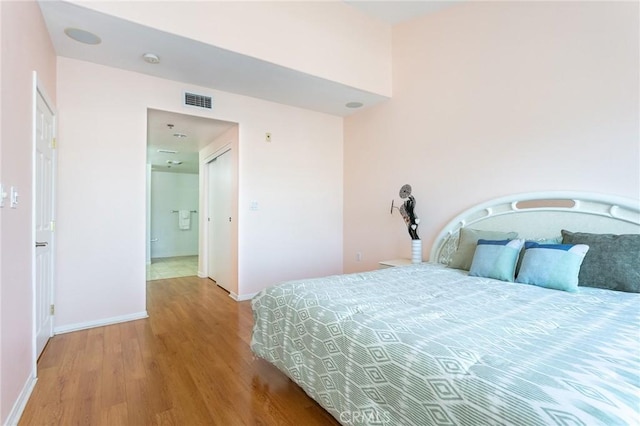580 W Main St Unit 323, Alhambra, CA 91801 - bedroom featuring wood finished floors and baseboards