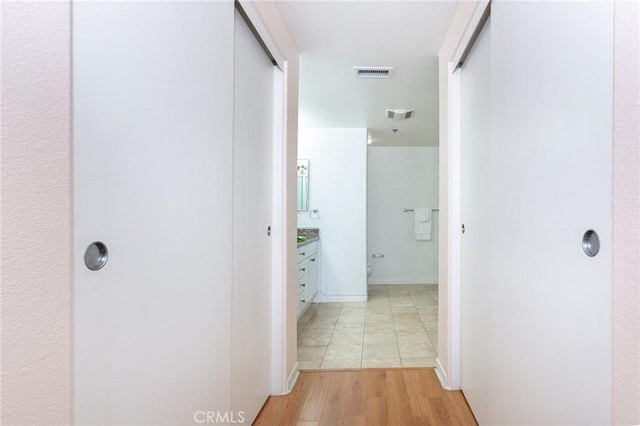 580 W Main St Unit 323, Alhambra, CA 91801 - hall featuring light wood-style floors