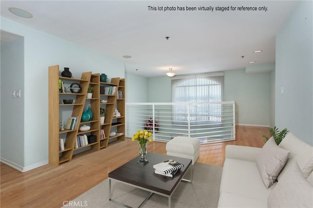 580 W Main St Unit 323, Alhambra, CA 91801 - living area with wood finished floors and baseboards