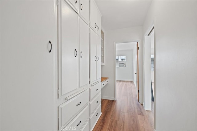 1273 E Appleton St Unit 4, Long Beach, CA 90802 - hall featuring light wood-style floors and baseboards