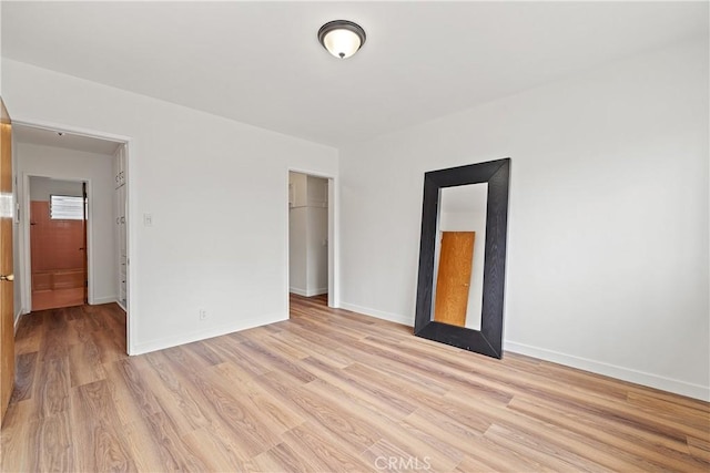 1273 E Appleton St Unit 4, Long Beach, CA 90802 - unfurnished bedroom featuring light wood-type flooring and a closet