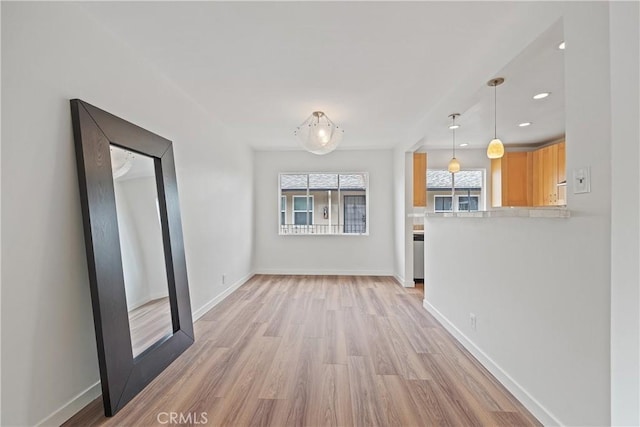1273 E Appleton St Unit 4, Long Beach, CA 90802 - unfurnished dining area with light wood-style floors, baseboards, and recessed lighting