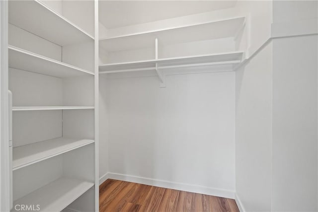 1273 E Appleton St Unit 4, Long Beach, CA 90802 - spacious closet featuring wood finished floors