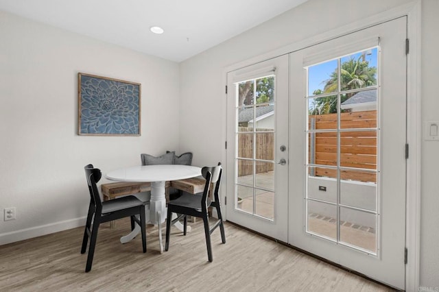 1125 Arcadia Rd, Encinitas, CA 92024 - dining room featuring french doors and light wood-type flooring