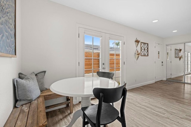 1125 Arcadia Rd, Encinitas, CA 92024 - dining area featuring french doors, light wood-type flooring, and recessed lighting