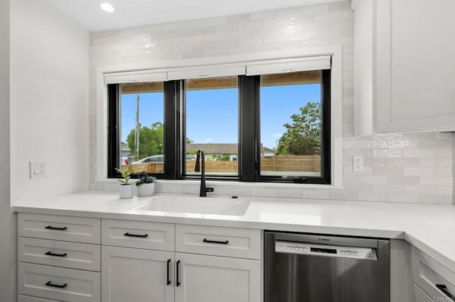 1125 Arcadia Rd, Encinitas, CA 92024 - kitchen featuring dishwasher, plenty of natural light, tasteful backsplash, and light countertops