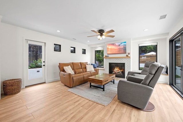 1125 Arcadia Rd, Encinitas, CA 92024 - living area with light wood-style flooring, a fireplace, ceiling fan, and recessed lighting