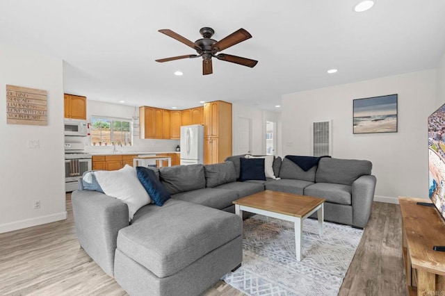 1125 Arcadia Rd, Encinitas, CA 92024 - living room featuring a ceiling fan, light wood-style flooring, and recessed lighting