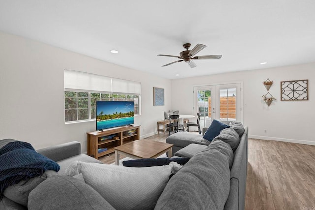 1125 Arcadia Rd, Encinitas, CA 92024 - living area with wood finished floors, french doors, a ceiling fan, and recessed lighting