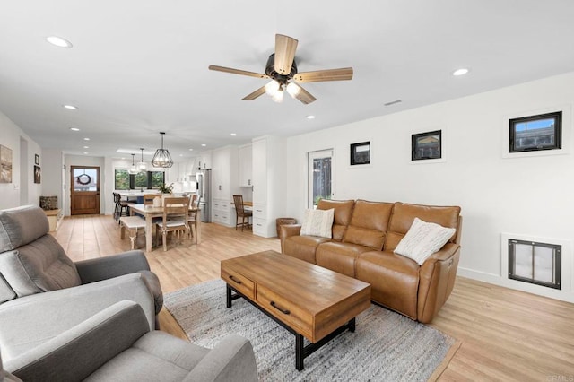 1125 Arcadia Rd, Encinitas, CA 92024 - living area with light wood-style flooring, recessed lighting, a chandelier, and a ceiling fan