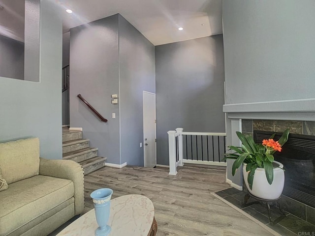 7755 Via Montebello Unit 2, San Diego, CA 92129 - living area featuring wood finished floors, a premium fireplace, and recessed lighting