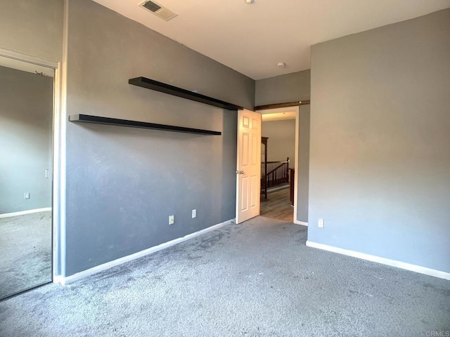 7755 Via Montebello Unit 2, San Diego, CA 92129 - unfurnished bedroom featuring carpet flooring and baseboards