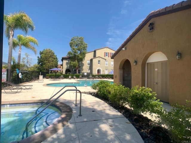 7755 Via Montebello Unit 2, San Diego, CA 92129 - community pool featuring a patio