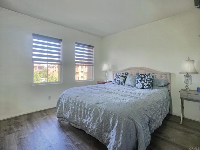 7755 Via Montebello Unit 2, San Diego, CA 92129 - bedroom with wood finished floors and baseboards