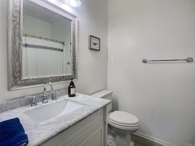 7755 Via Montebello Unit 2, San Diego, CA 92129 - bathroom featuring vanity and wood finished floors