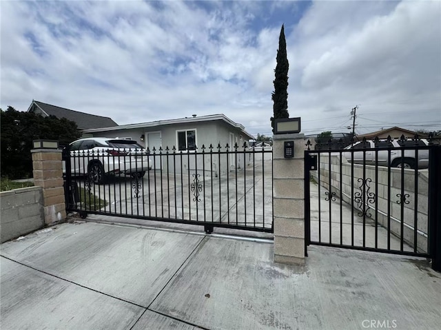 951 E Elma St, Ontario, CA 91764 - gate featuring a fenced front yard