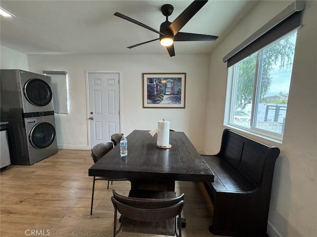 951 E Elma St, Ontario, CA 91764 - dining room with stacked washer / drying machine, ceiling fan, light wood-style floors, and baseboards