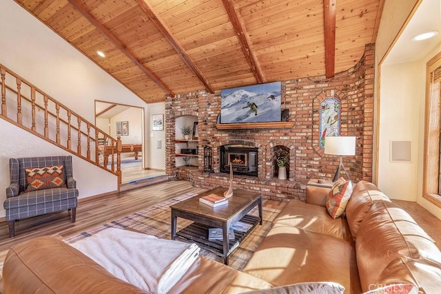 42756 Tannenbaum Platz, Big Bear Lake, CA 92315 - living room with wood ceiling, stairs, wood finished floors, a brick fireplace, and baseboards