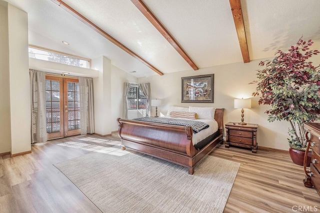 42756 Tannenbaum Platz, Big Bear Lake, CA 92315 - bedroom with french doors, multiple windows, access to exterior, baseboards, and beam ceiling
