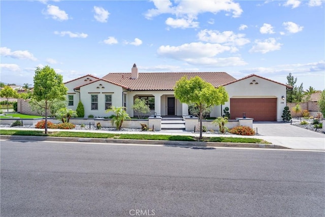 288 Shorey Dr, Glendora, CA 91741 - mediterranean / spanish-style house featuring driveway, a tiled roof, a garage, a chimney, and stucco siding