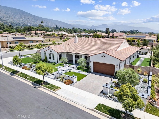 288 Shorey Dr, Glendora, CA 91741 - mediterranean / spanish-style home featuring a residential view, a garage, stucco siding, driveway, and a tile roof