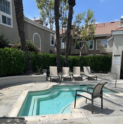 25055 Calle Playa Unit F, Laguna Niguel, CA 92677 - view of swimming pool featuring a patio area and a pool
