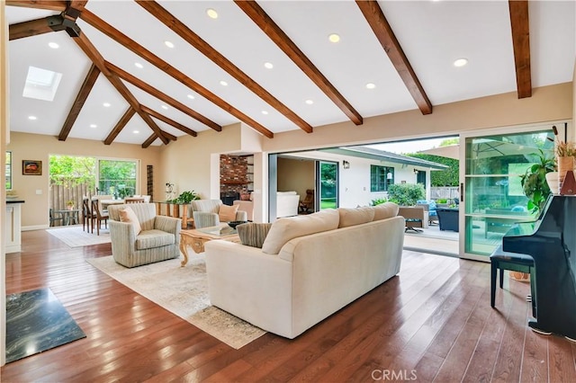 128 Rocky Point Rd, Palos Verdes Estates, CA 90274 - living room featuring beamed ceiling, a skylight, wood finished floors, high vaulted ceiling, and recessed lighting