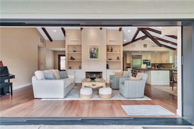 128 Rocky Point Rd, Palos Verdes Estates, CA 90274 - living room featuring baseboards, light wood finished floors, and recessed lighting