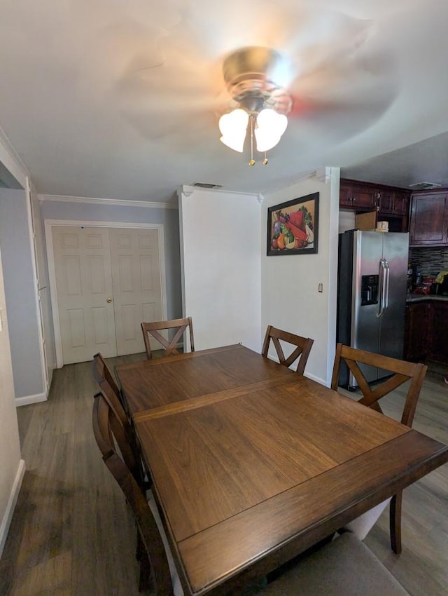 751 Glenwood Ln, Willows, CA 95988 - dining space featuring wood finished floors, ceiling fan, baseboards, and ornamental molding