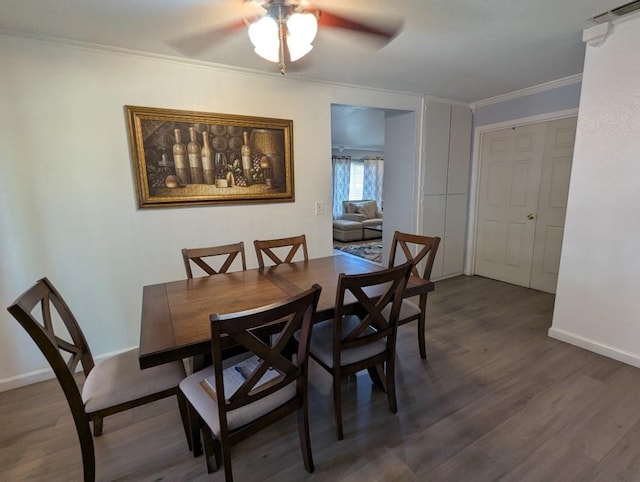 751 Glenwood Ln, Willows, CA 95988 - dining area with a ceiling fan, crown molding, wood finished floors, and baseboards