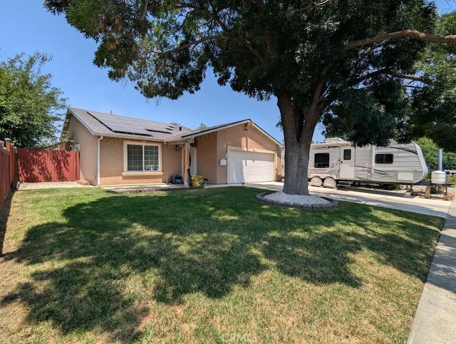 751 Glenwood Ln, Willows, CA 95988 - single story home featuring stucco siding, solar panels, a garage, and concrete driveway
