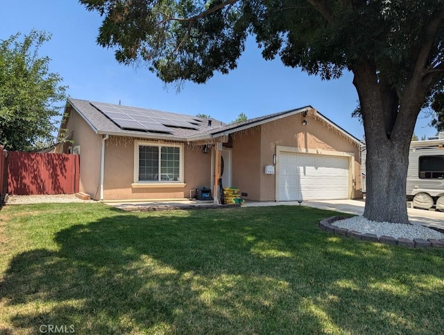751 Glenwood Ln, Willows, CA 95988 - ranch-style home featuring stucco siding, an attached garage, solar panels, and concrete driveway