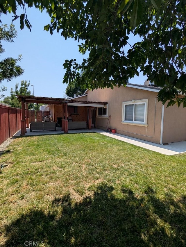 751 Glenwood Ln, Willows, CA 95988 - view of front of home with stucco siding and a patio area