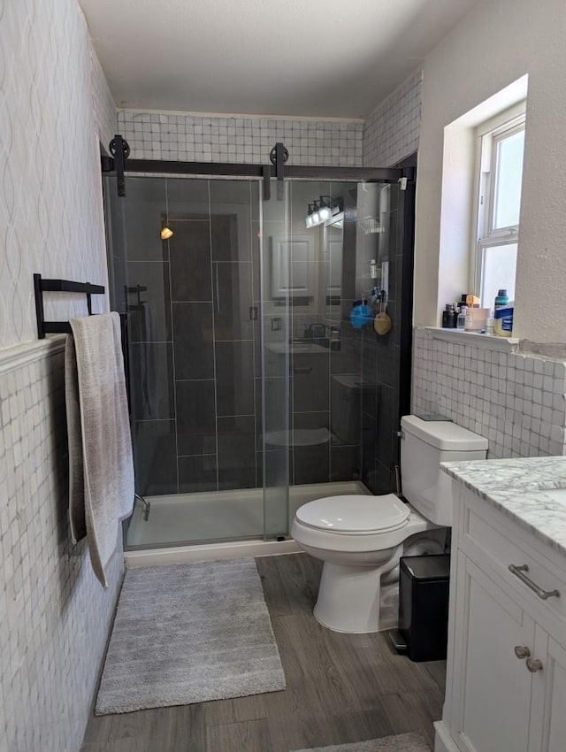 751 Glenwood Ln, Willows, CA 95988 - full bathroom featuring wood finished floors, toilet, vanity, and a shower stall