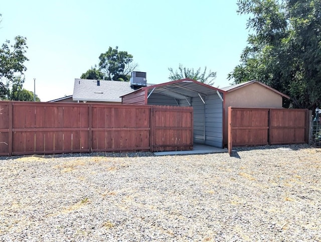 751 Glenwood Ln, Willows, CA 95988 - view of yard featuring central air condition unit and a carport