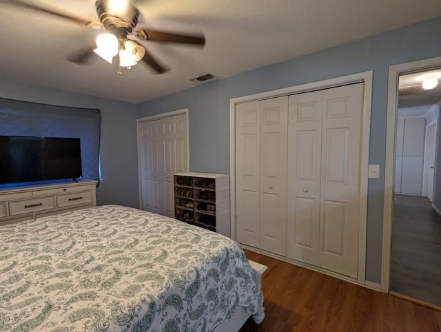 751 Glenwood Ln, Willows, CA 95988 - bedroom with multiple closets, dark wood-style flooring, and ceiling fan